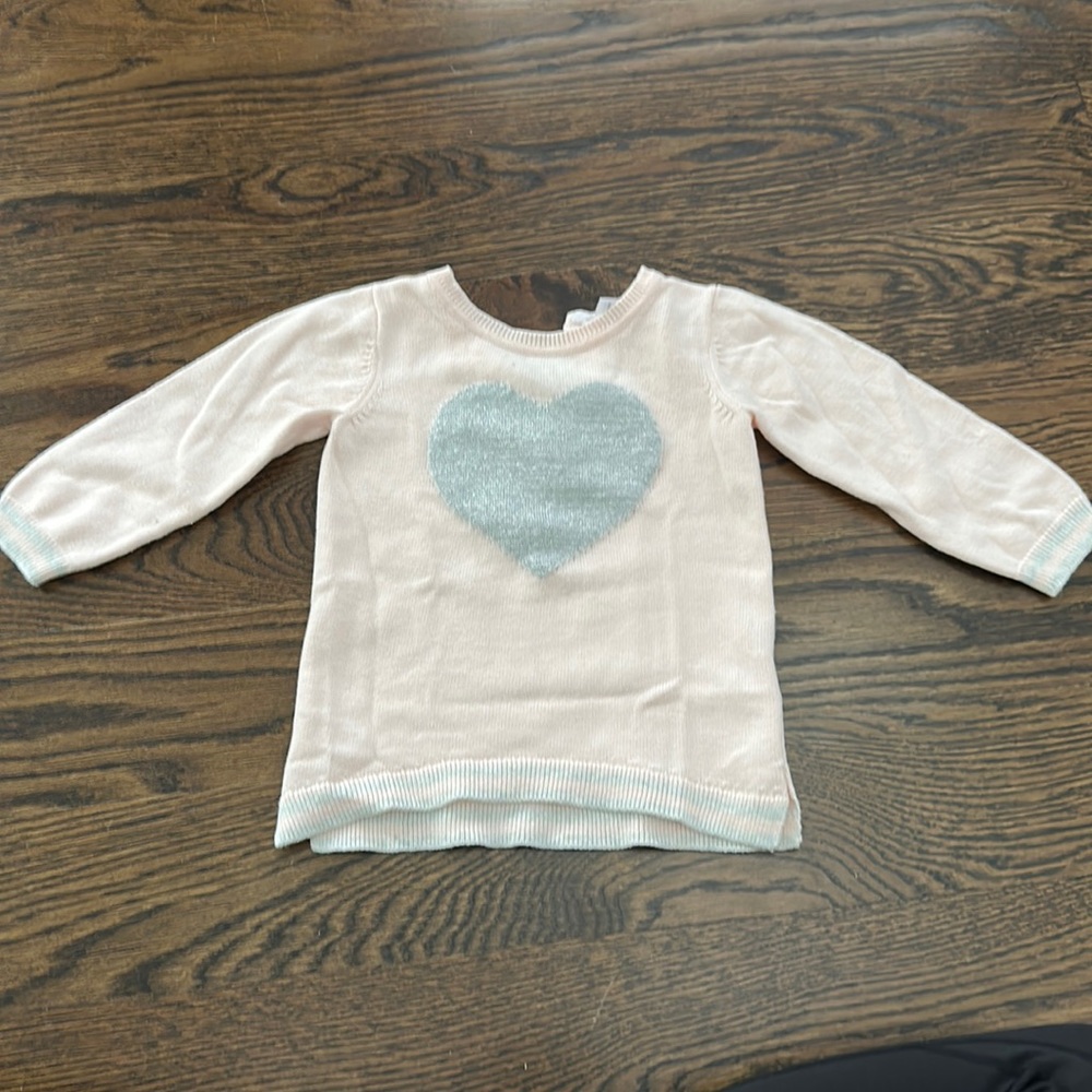 Baby girl pink bloomingdales sweater with heart. 12 months